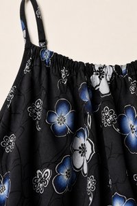 Robe grande taille à bretelles imprimé fleuri coupe trapèze fluide mi-genou