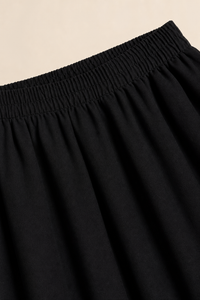 Jupe longue grande taille coupe évasée tissu fluide ceinture élastiquée froncée
