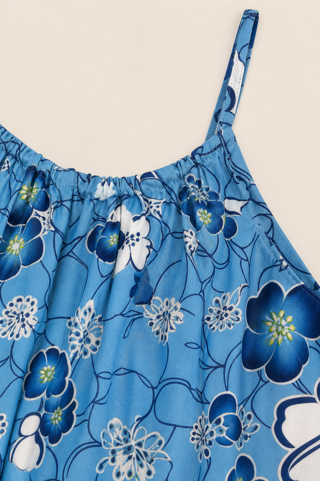 Robe grande taille à bretelles imprimé fleuri coupe trapèze fluide mi-genou