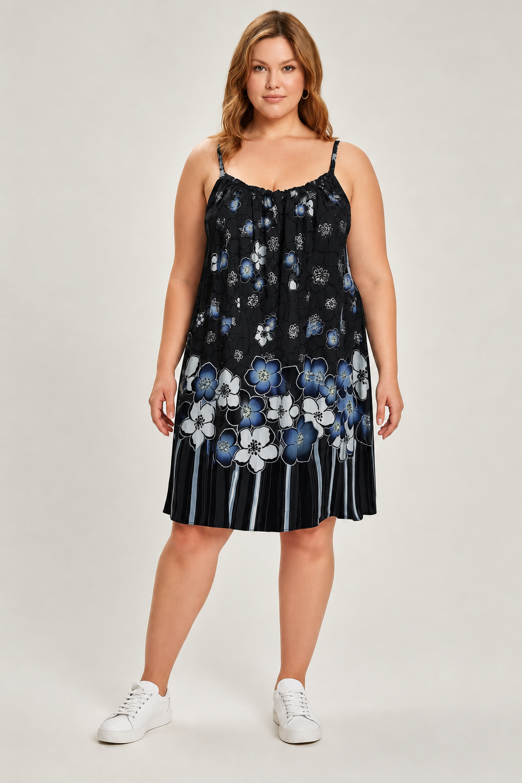 Robe grande taille à bretelles imprimé fleuri coupe trapèze fluide mi-genou