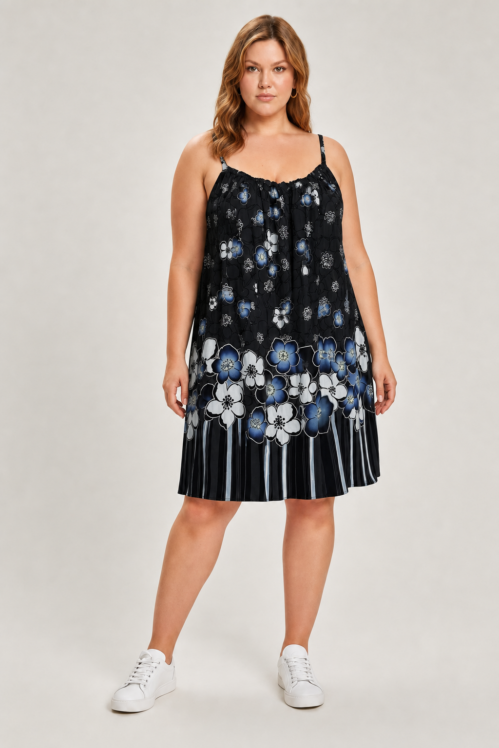 Robe grande taille à bretelles imprimé fleuri coupe trapèze fluide mi-genou